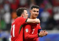 Digo Jota y Cristiano Ronaldo (Photo by Stu Forster/Getty Images)