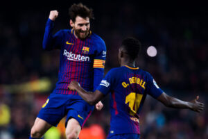Lionel Messi y Ousmane Dembele  